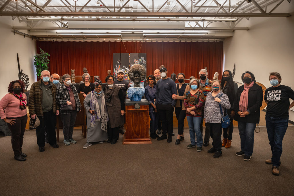  Honoring Dr. Warren Washington, climate scientist, for Black History Month (Photo of people gathered for theunveiling event at Evergreen College Tacoma Campus).